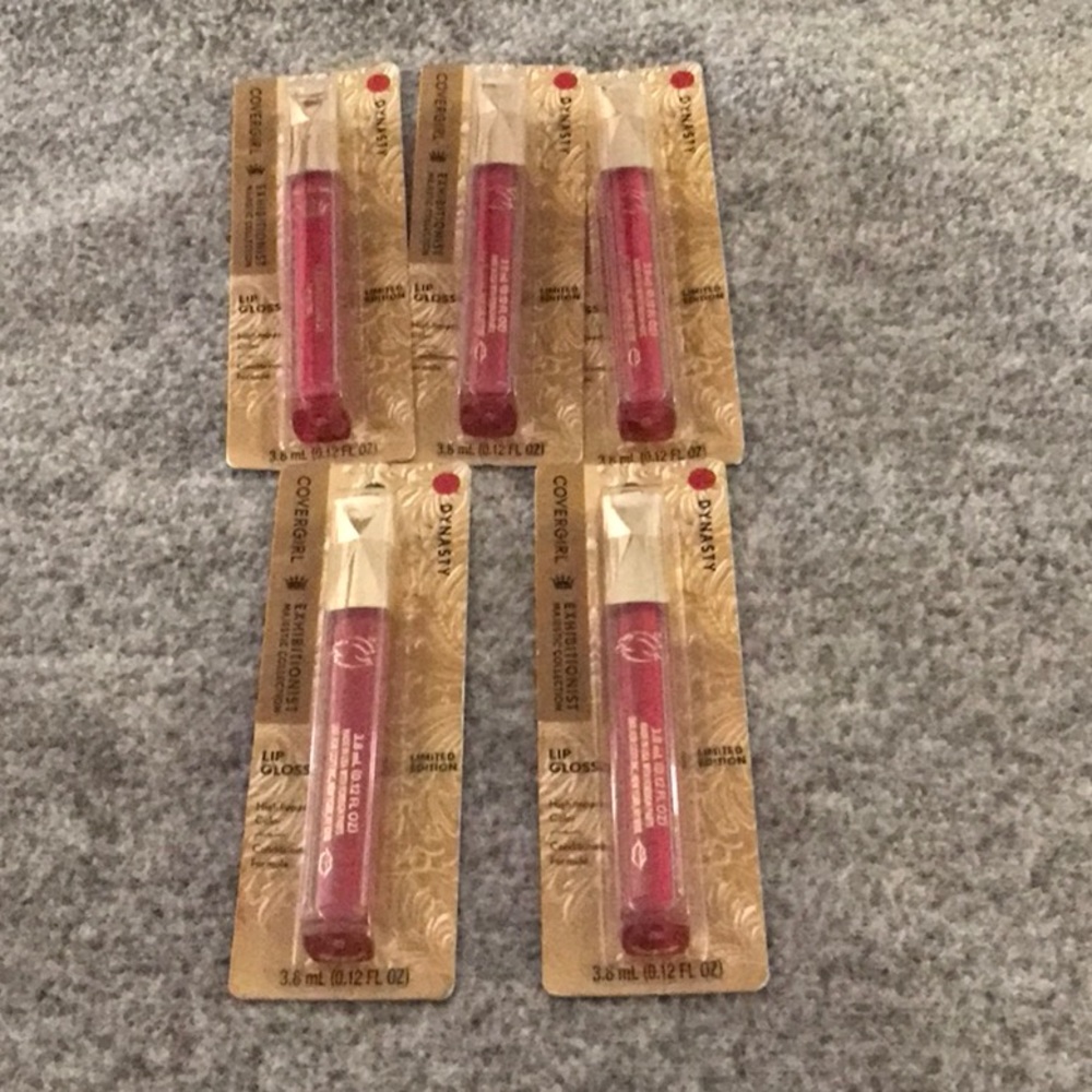 A lot of  5 Cover girl lip gloss color dynasty